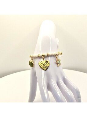 Gold And White Beaded Charm Bracelet With Heart Shell And Starfish Accents Stret